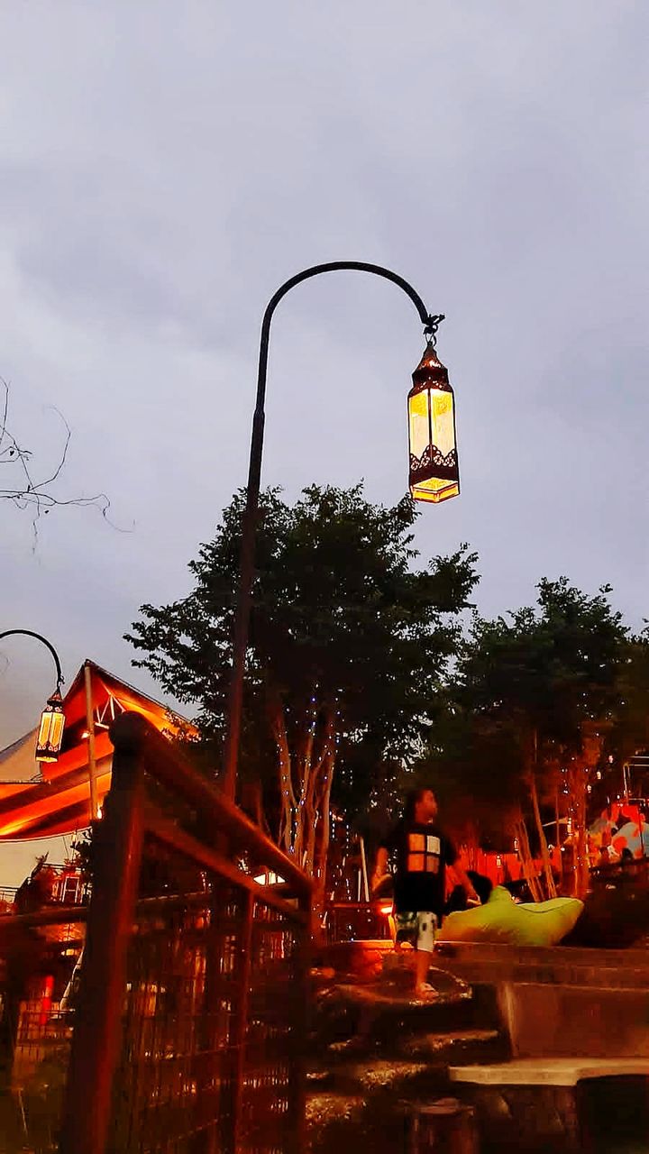 small children playing in the evening Play In Nature Children Sunset Nature Lamp Pinus Atmospheric Mood Overcast First Eyeem Photo