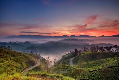 Scenic view of landscape against sky during sunset