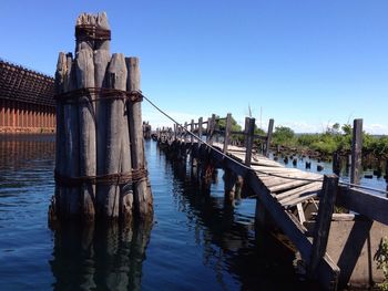 Bridge over river against clear sky