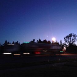 Light trails on road at night