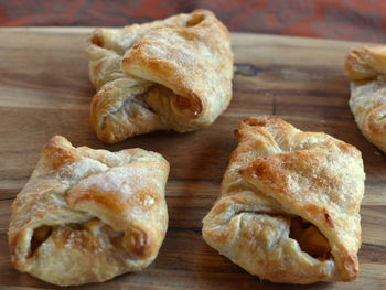 Close-up of apple pie pastries on table