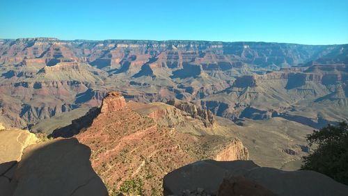 Scenic view of mountains against clear sky