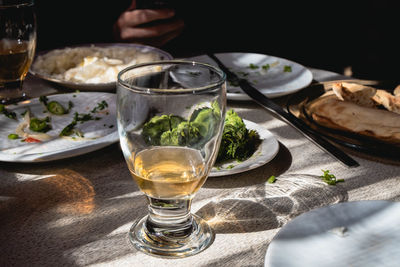 High angle view of beer glass on table in restaurant