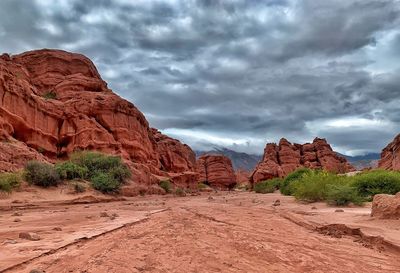 Rock formations in desert against sky