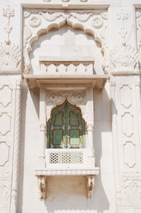 Low angle view of cross on building