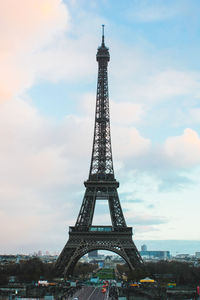 Low angle view of tower against cloudy sky