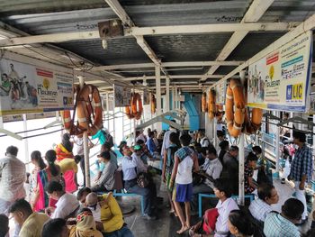 High angle view of people walking in bus