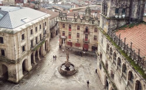 High angle view of street amidst buildings in town