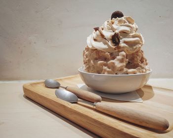 Close-up of ice cream in bowl on table