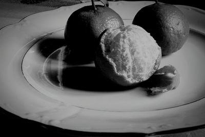 High angle view of fruit in plate on table