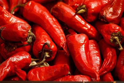 Full frame shot of red chili peppers for sale at market stall