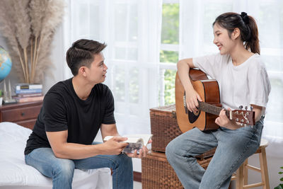 Young man playing guitar