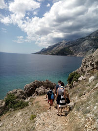 Scenic view of sea against cloudy sky