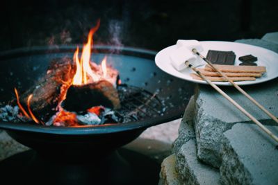 Close-up of barbecue grill and food