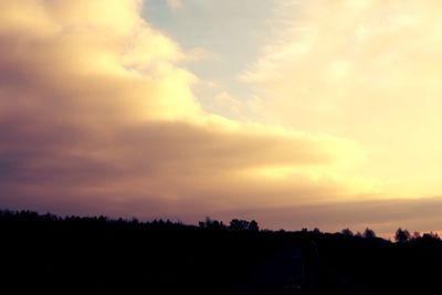 Scenic view of silhouette landscape against sky during sunset