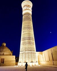 Low angle view of tower against blue sky