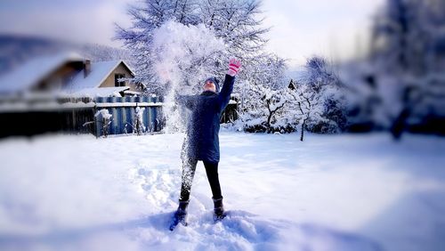Full length of snow on tree against sky during winter