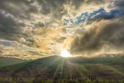 Scenic view of sunset over land