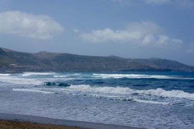 View of sea against cloudy sky