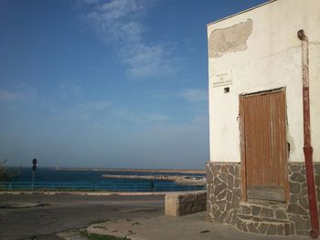 View of calm sea against blue sky