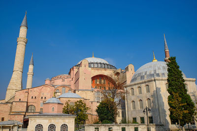 Historic building against clear blue sky