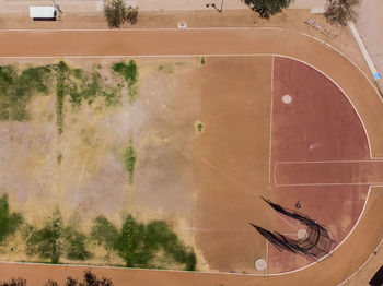 High angle view of trees by wall