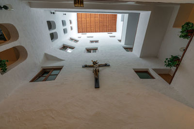 Low angle view of crucifix on wall