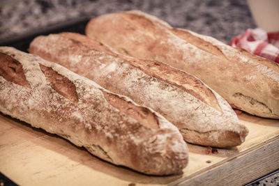 Close-up of breads on cutting board