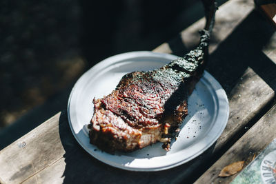 High angle view of meat in plate on table