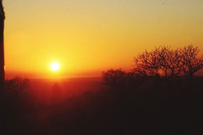 Scenic view of landscape against sky during sunset