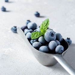 Close-up of fruits in bowl on table