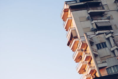 Low angle view of buildings against clear sky