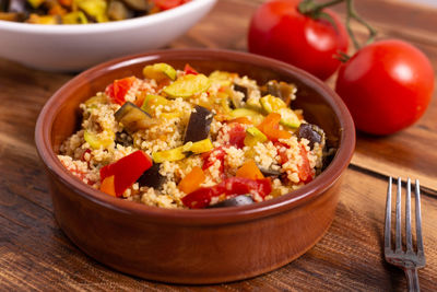 High angle view of chopped fruits in bowl on table