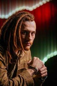 Portrait of redhead man with dreadlocks