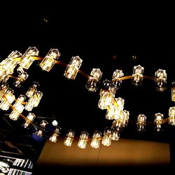 Low angle view of illuminated chandelier