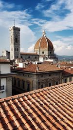 View of cathedral and buildings against sky