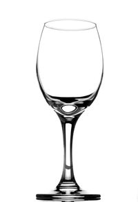 Close-up of beer glass against white background