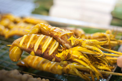 Close-up of meat on barbecue grill