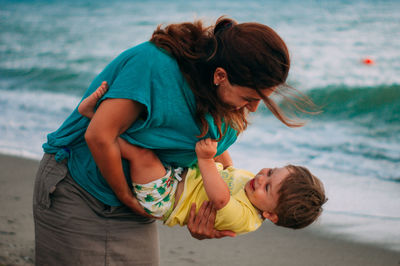 Mother and son on beach