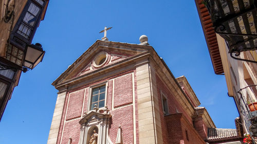 Low angle view of buildings against sky