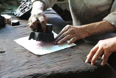 Close-up of hands working