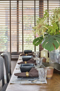 Potted plants on table at home