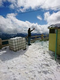 Full length of man standing against sky