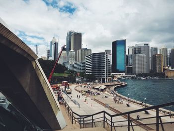 City skyline against cloudy sky