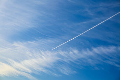 Low angle view of vapor trail in sky