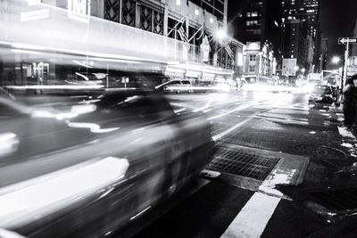 Blurred motion of cars on road at night