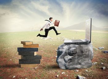 Digital composite image of man standing on field against sky