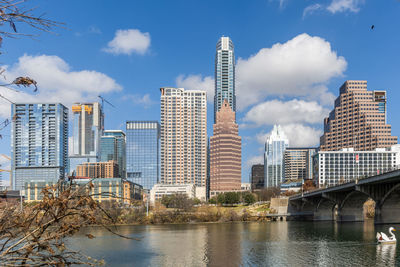 Buildings in city against sky