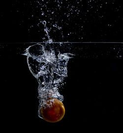 Close-up of water against black background