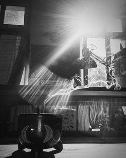 Woman looking through window